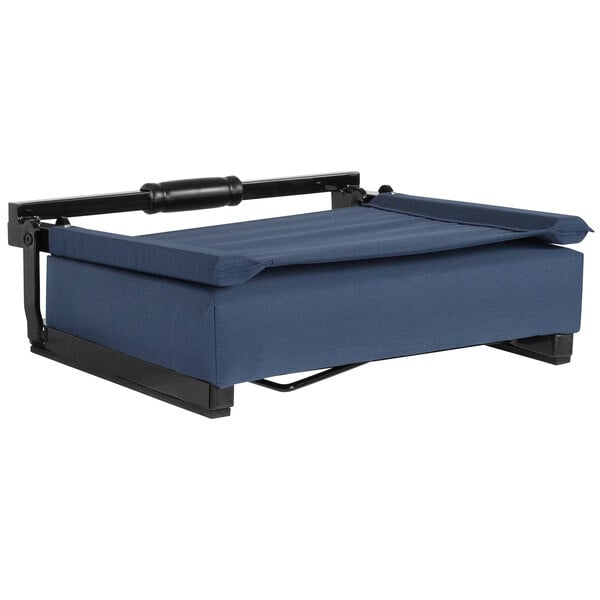 a blue cushioned chair with black armrests