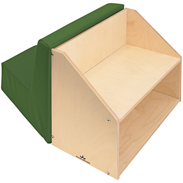 A wooden shelf with a green cushion on top.