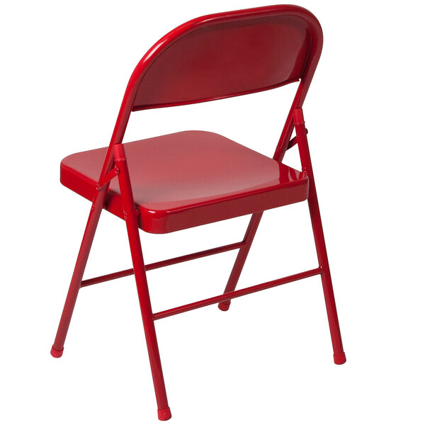 A red Flash Furniture metal folding chair with a backrest.