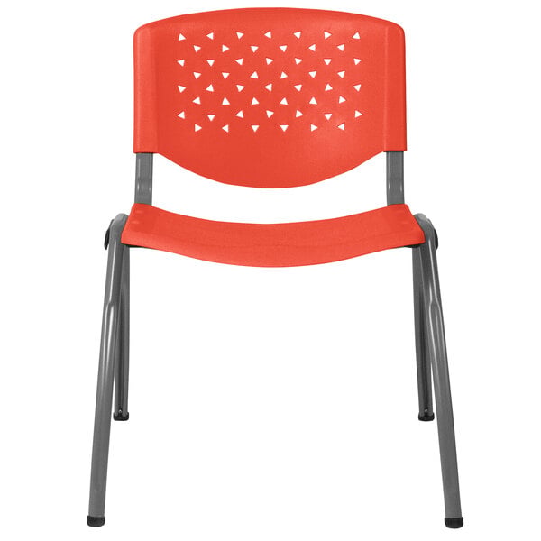 An orange plastic Flash Furniture stack chair with a metal frame.