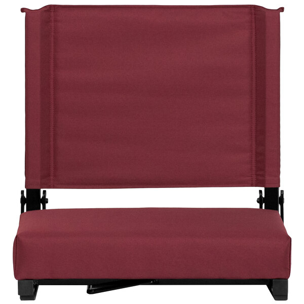 A Flash Furniture Grandstand Maroon Ultra-Padded Bleacher Comfort Seat with a cushion on the seat.