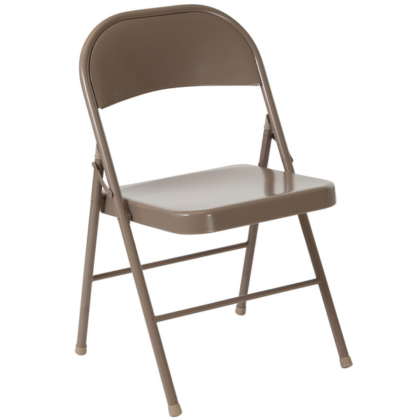 A beige metal folding chair.