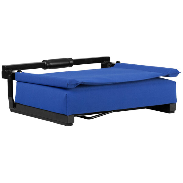 A blue cushioned Flash Furniture bleacher seat on a black frame.