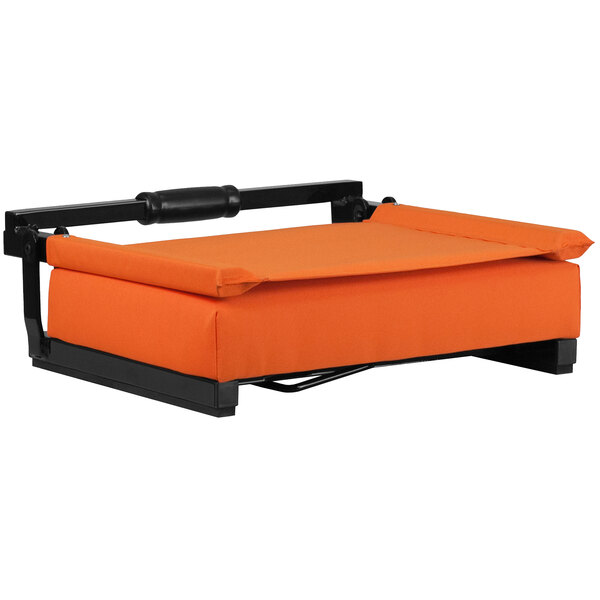A Flash Furniture Grandstand orange cushioned seat on a black frame.