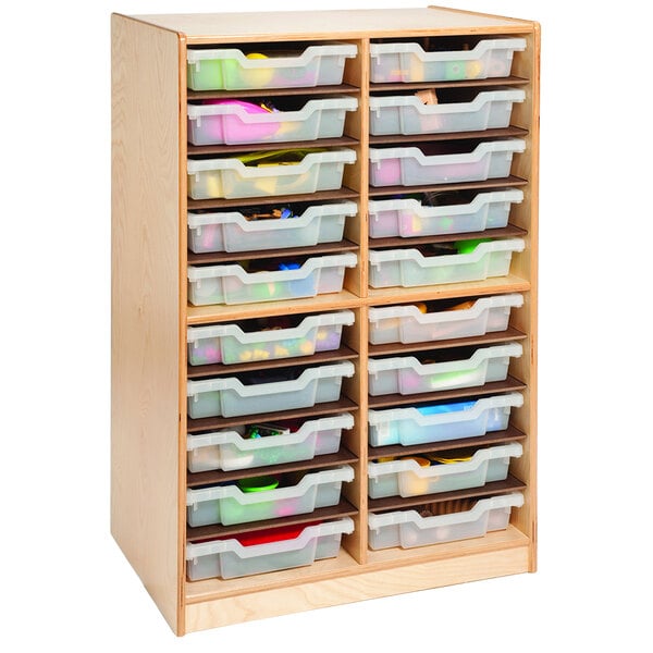 A Whitney Brothers wooden cabinet with plastic bins.