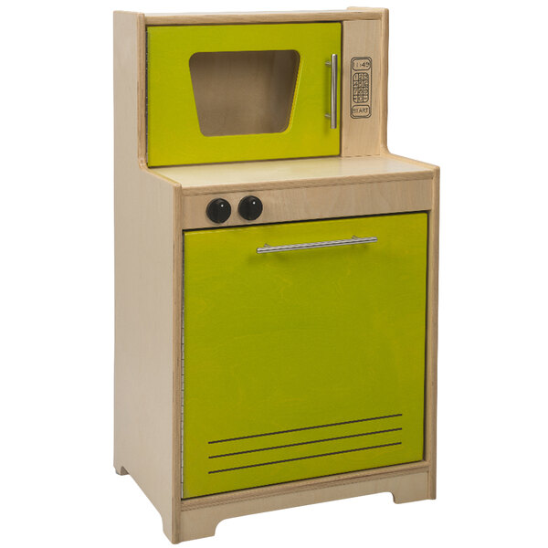 A Whitney Brothers electric lime wood microwave and dishwasher on a toy kitchen counter with oven and oven door.
