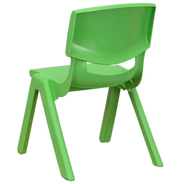 A green plastic Flash Furniture school chair with legs.