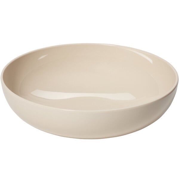 A Manila melamine serving bowl with a beige interior.