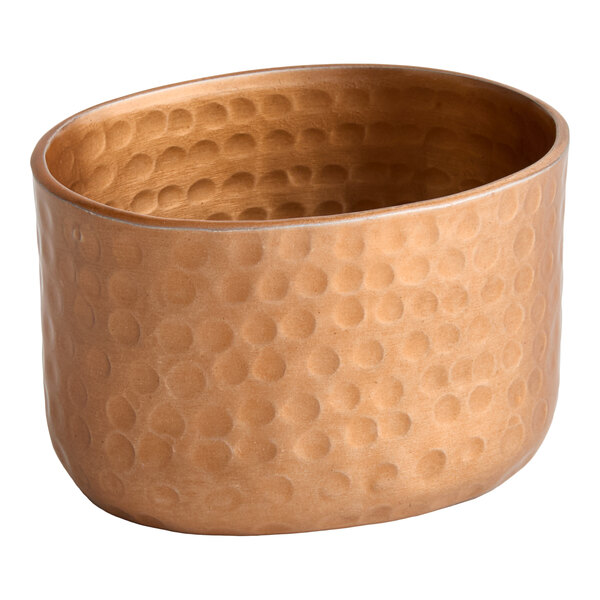 An American Metalcraft copper sugar packet holder with a textured surface.