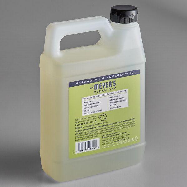 A white jug of Mrs. Meyer's Lemon Verbena hand soap refill with a green label.