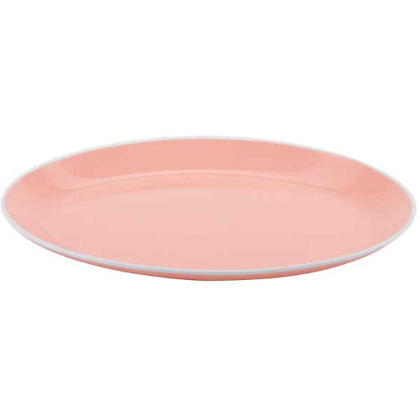 A pink plate with a white rim.