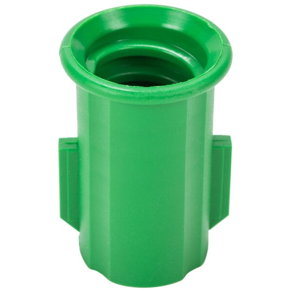 A green plastic Unger Acme insert with a hole.