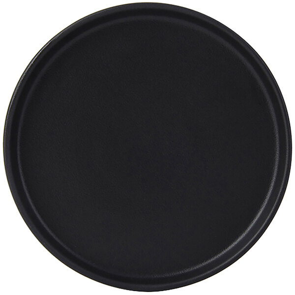 a black round object with a white background