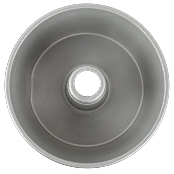 A silver Chicago Metallic angel food cake pan with a hole in the center.