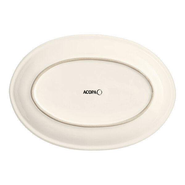 a white oval plate with black text