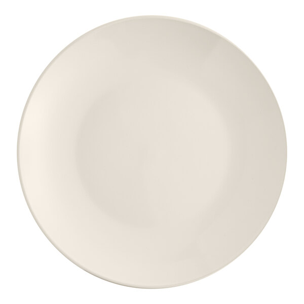 An Acopa ivory stoneware plate with a circular edge on a white background.