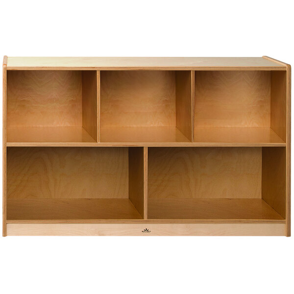 A wooden Whitney Brothers children's cabinet with shelves.