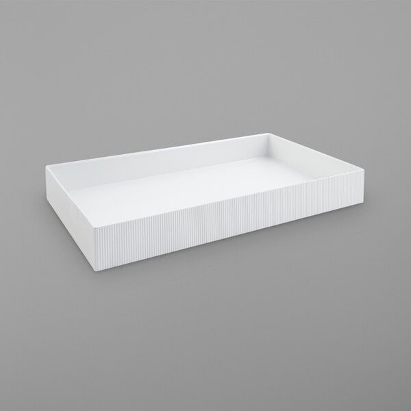 A white rectangular underliner with a rectangular edge.