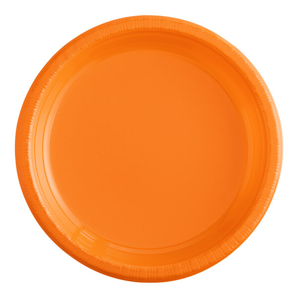 A Sunkissed Orange plastic plate with a white background.