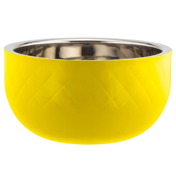 A yellow Bon Chef serving bowl with a stainless steel rim.