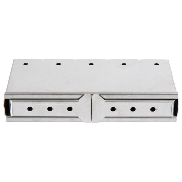 A stainless steel Town wood chip smoking box with holes.