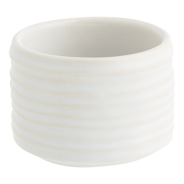 An American Metalcraft white porcelain bowl with ribbed sides.
