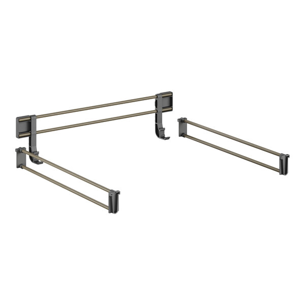 A pair of black metal bars with gold handles.