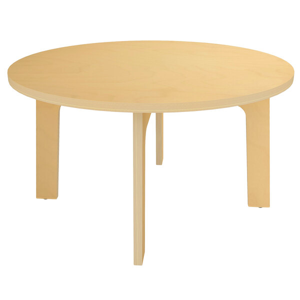 A Whitney Brothers round wooden children's table with legs.