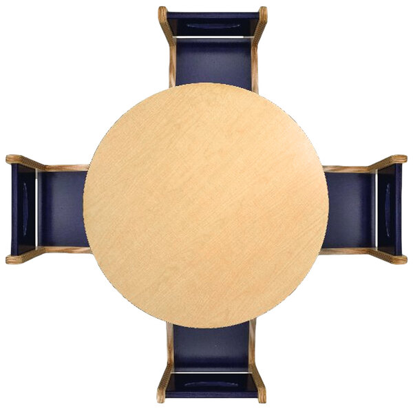 A Whitney Brothers round wood children's table and chairs.