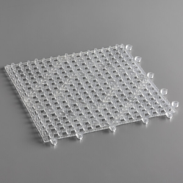 A clear plastic Choice bar mat with interlocking holes.