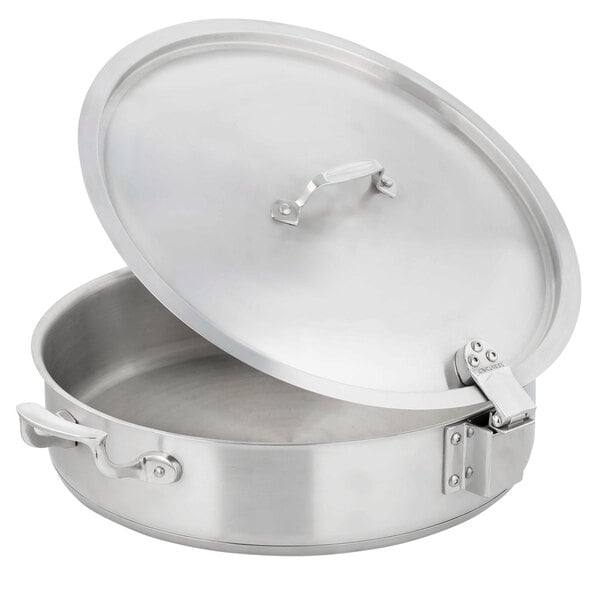 A silver stainless steel Bon Chef brazier pan with a hinged lid.