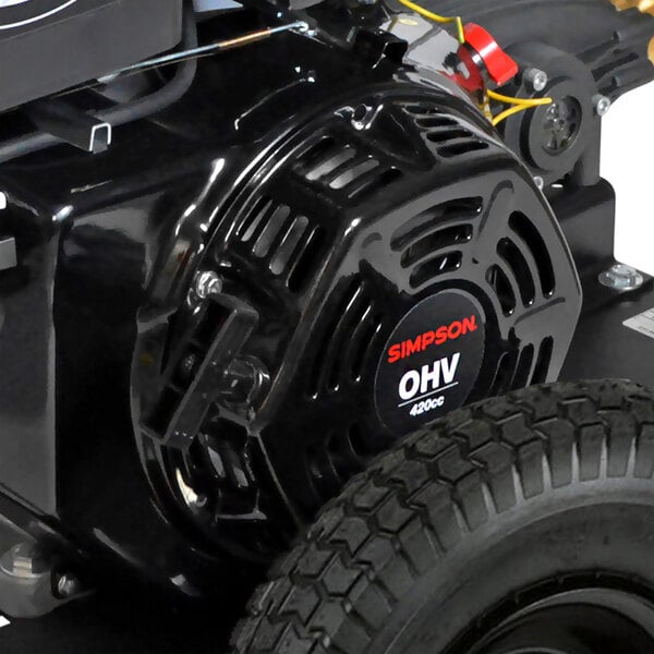 A Simpson gas-powered pressure washer with a hose attached.