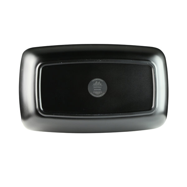 A black rectangular melamine bowl with a white interior.