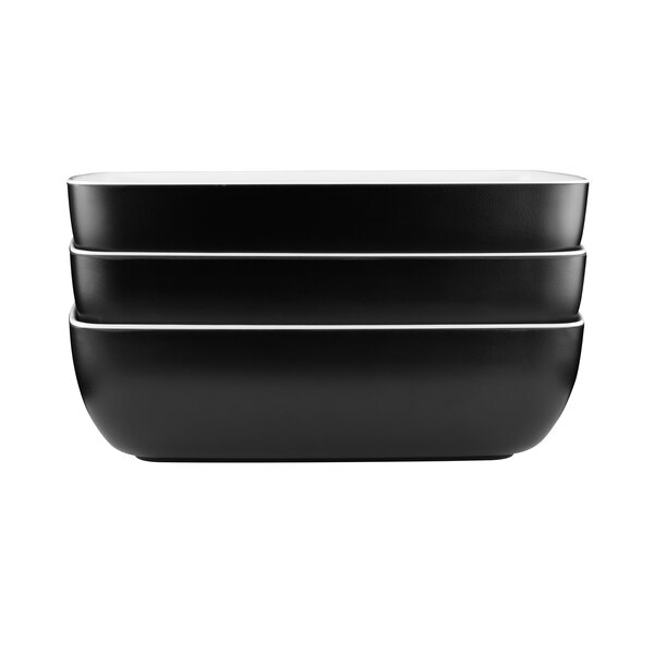 A stack of three black Elite Global Solutions rectangular melamine bowls.