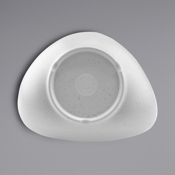 A white triangle melamine serving bowl with speckled edges.