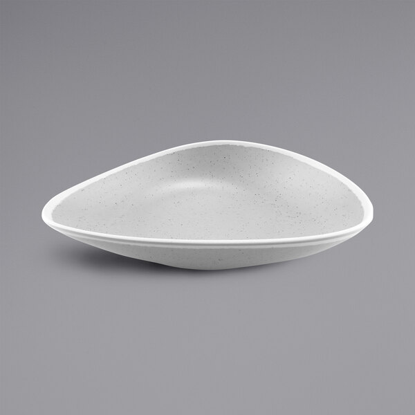 a white bowl on a gray background