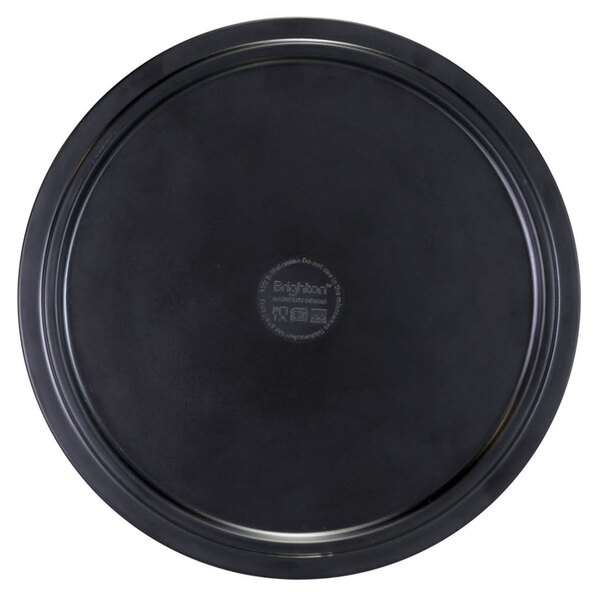 A black Elite Global Solutions round melamine bowl lid on a black plate.