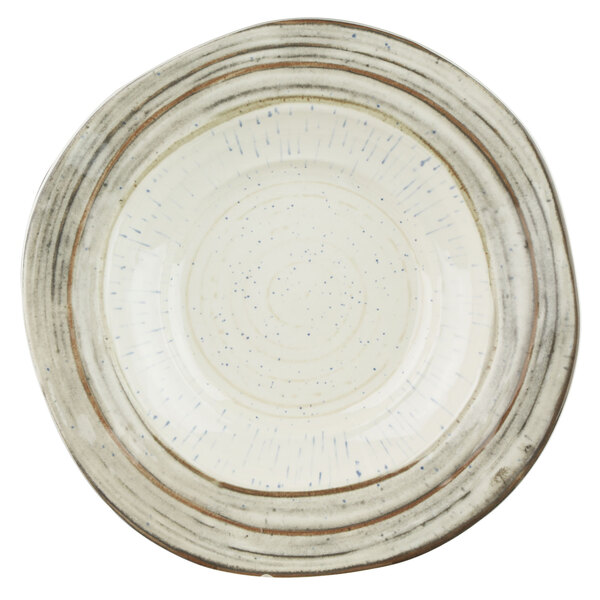 A white melamine bowl with brown speckled designs.