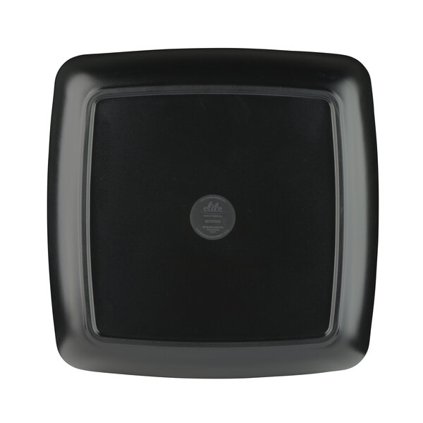 A black square Elite Global Solutions melamine bowl with a white interior and a silver circle on the inside.