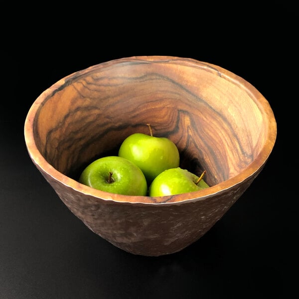 An Elite Global Solutions Sequoia melamine serving bowl filled with green apples.