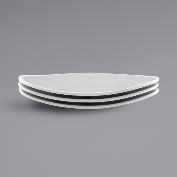 A stack of three gray speckled triangle melamine plates.