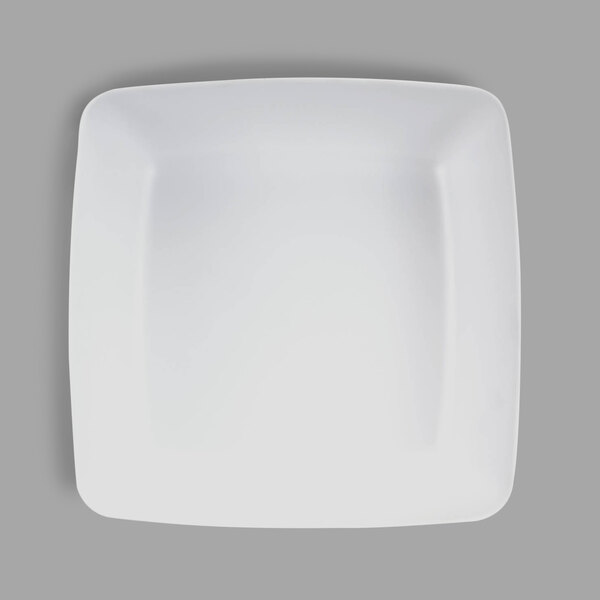 A white square melamine bowl with a black and white square design.