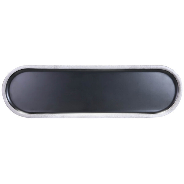 A black rectangular lid with a white surface and silver trim.