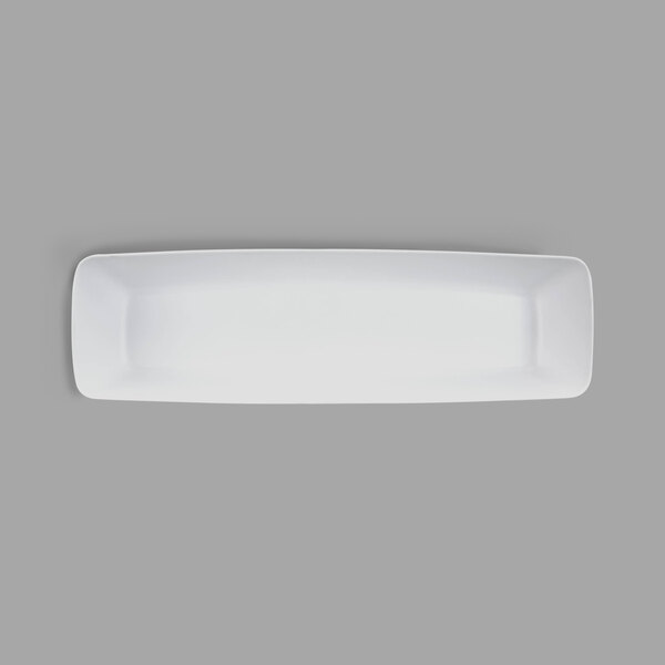 A white rectangular melamine bowl with chocolate and white speckles.