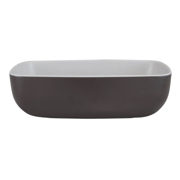 A rectangular brown and white melamine bowl with a black rim.