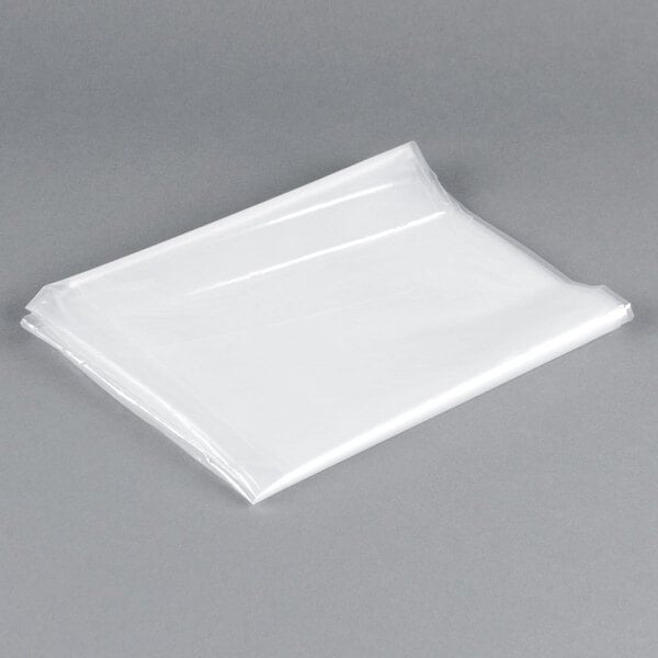 A white plastic bag on a gray background.