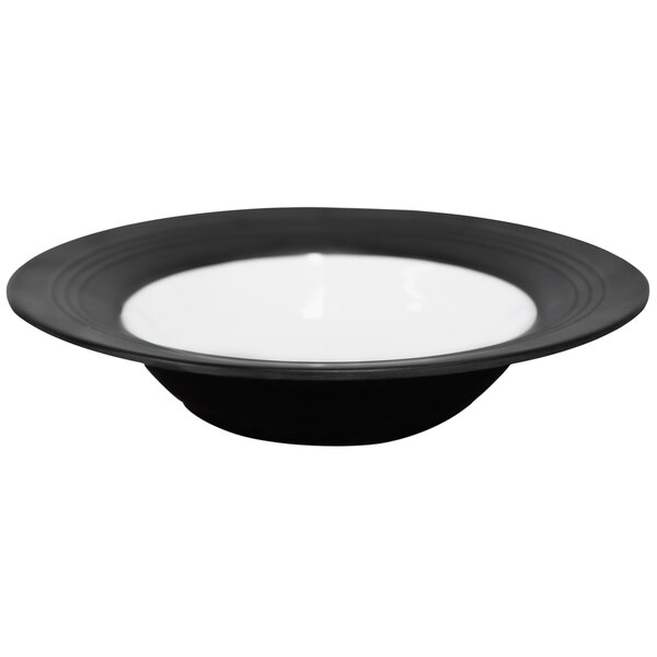 A black bowl with a white rim.