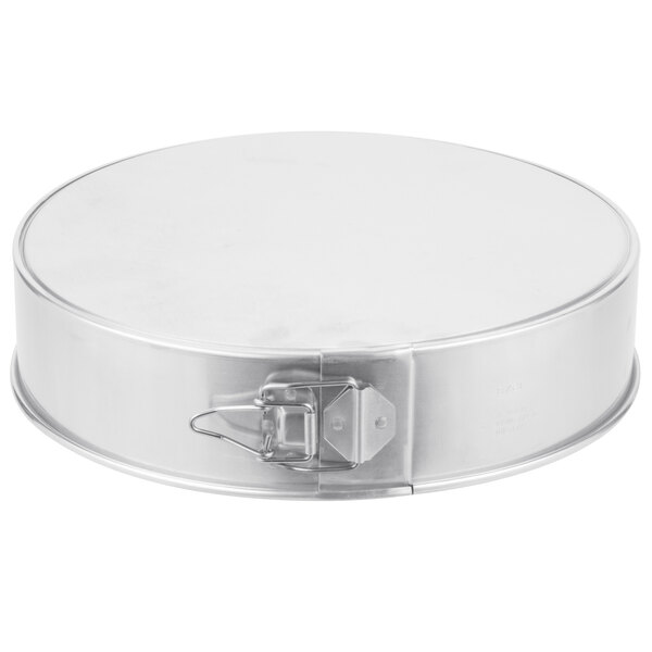 A Chicago Metallic round aluminum springform cake pan.