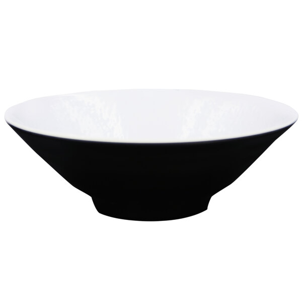 a black bowl with a white rim