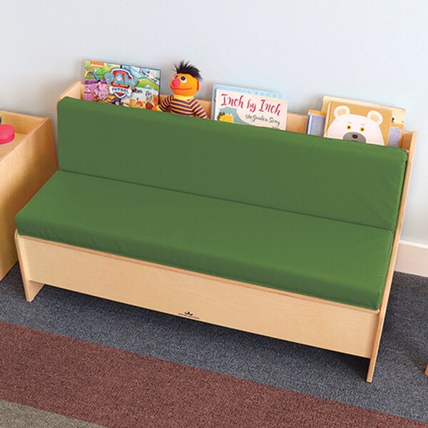 A green cushioned Whitney Brothers Comfy Reading Center with books on top.
